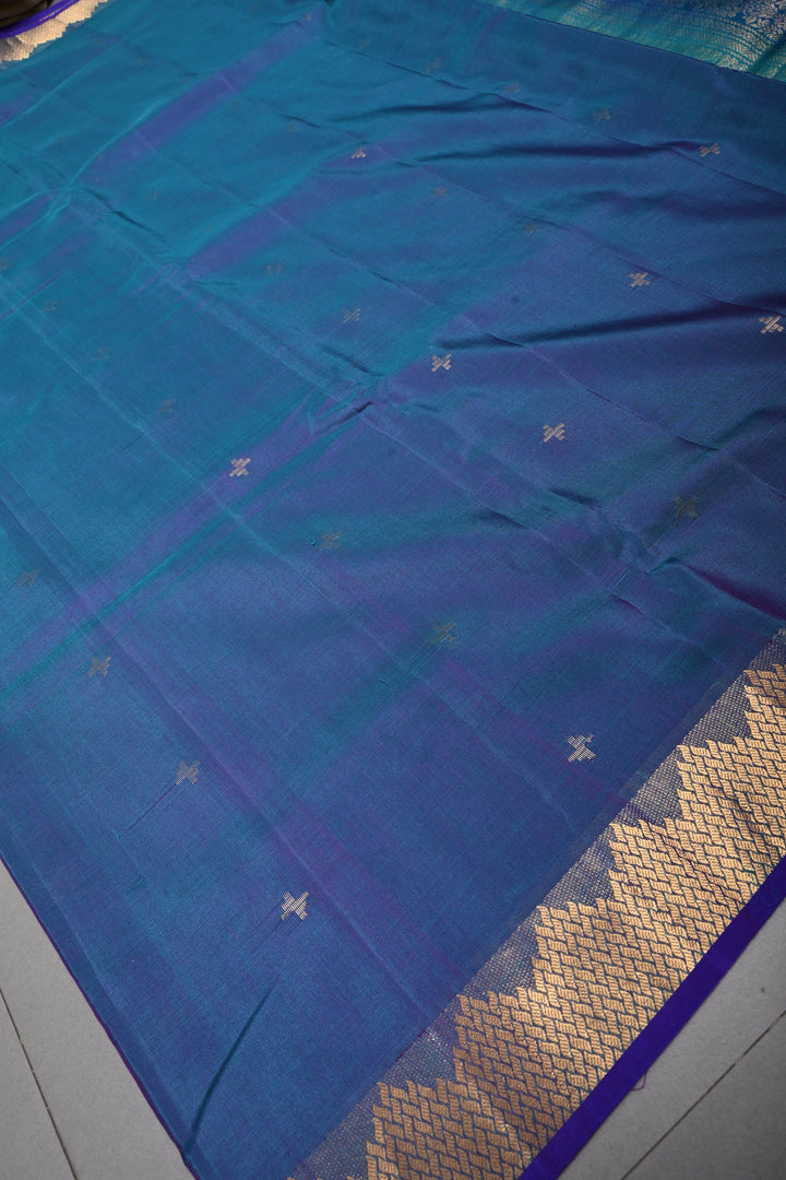 Peacock Blue Dual Tone Handloom Silk By Tencel Saree with Zari Buttas and Self Zari Border| SHOBITAM
