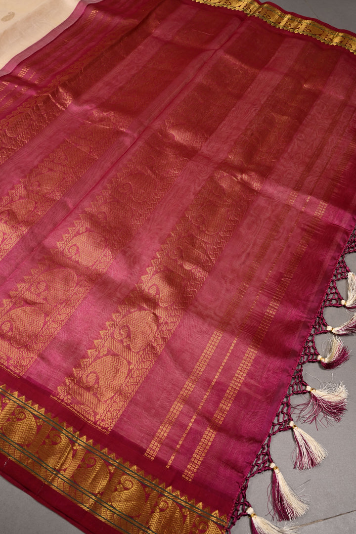 Off White Kanchi Silk Cotton Handloom Saree with Paisley Zari Buttas and Contrast Zari Border | SHOBITAM