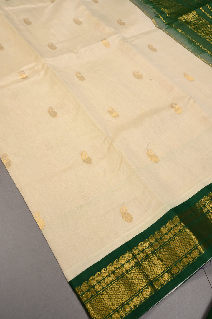 Ivory Kanchi Silk Cotton 100% Handloom Saree with Paisley Zari Buttas and Contrast Zari Border | SHOBITAM