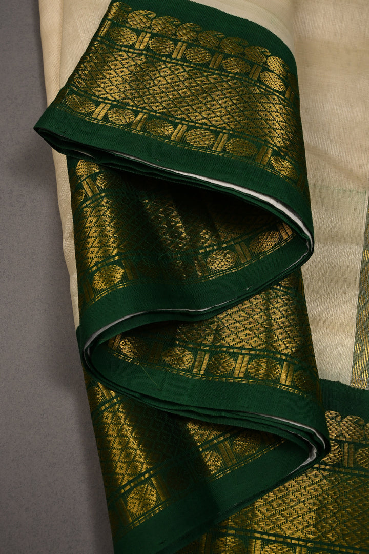 Ivory Kanchi Silk Cotton 100% Handloom Saree with Paisley Zari Buttas and Contrast Zari Border | SHOBITAM