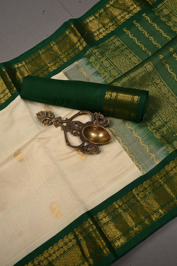 Ivory Kanchi Silk Cotton 100% Handloom Saree with Paisley Zari Buttas and Contrast Zari Border | SHOBITAM