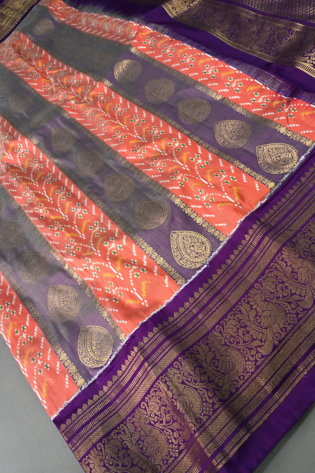 Orange-Purple Ikkat Kanjivaram Fusion Pure Silk Saree with Buttas Panel -Brocade and Zari Border | SILK MARK CERTIFIED | SHOBITAM