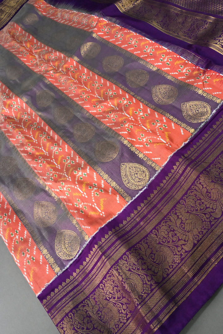 Orange-Purple Ikkat Kanjivaram Fusion Pure Silk Saree with Buttas Panel -Brocade and Zari Border | SILK MARK CERTIFIED | SHOBITAM