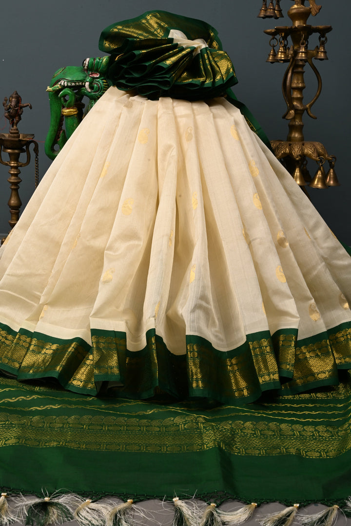 Ivory Kanchi Silk Cotton 100% Handloom Saree with Paisley Zari Buttas and Contrast Zari Border | SHOBITAM