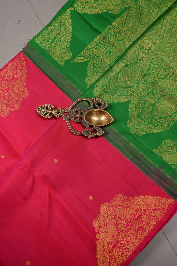 Rani Pink Dual Tone Pure Kanjivaram Silk Saree in Zari Buttas with Twin Peacock Zari Border | SILK MARK CERTIFIED | SHOBITAM