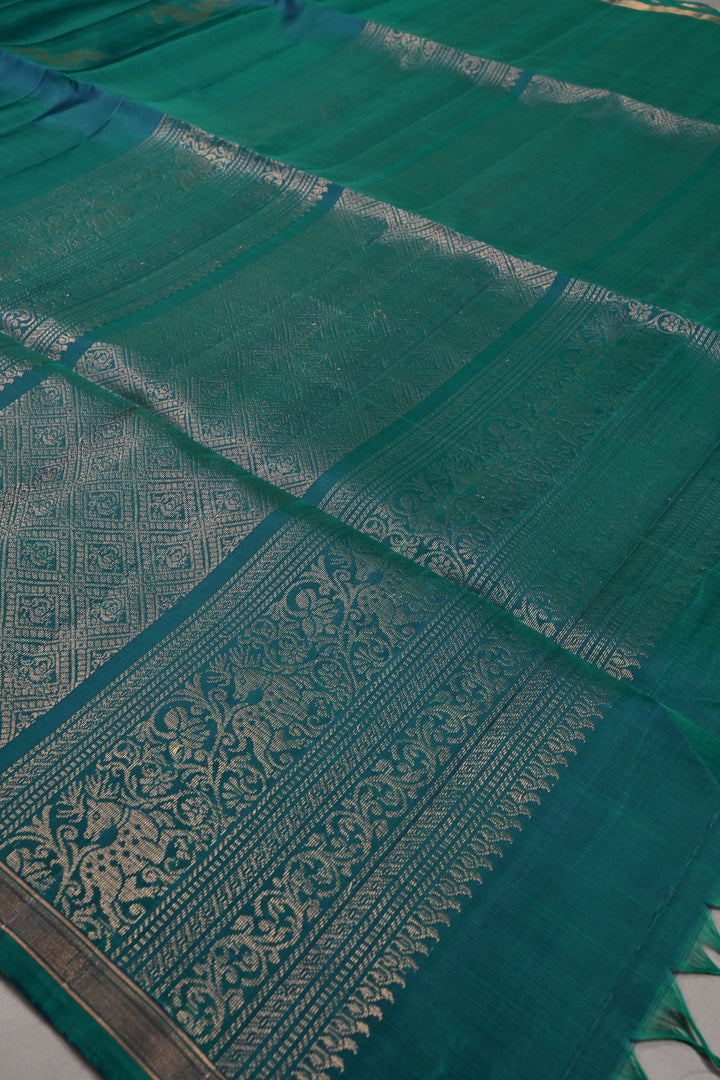 Peacock Green Dual Tone Kanjivaram Soft Silk Saree with Deer Zari Buttas and Minimal Zari Border | SILK MARK CERTIFIED | SHOBITAM