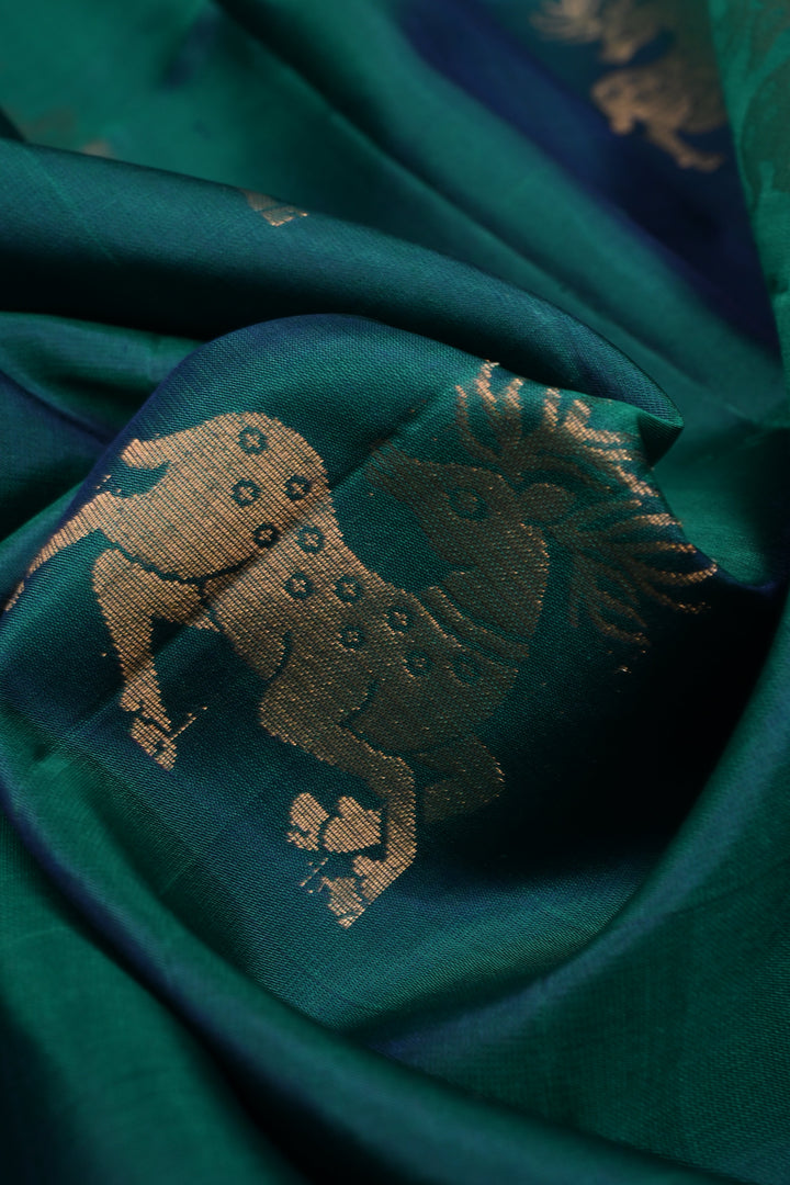 Peacock Green Dual Tone Kanjivaram Soft Silk Saree with Deer Zari Buttas and Minimal Zari Border | SILK MARK CERTIFIED | SHOBITAM