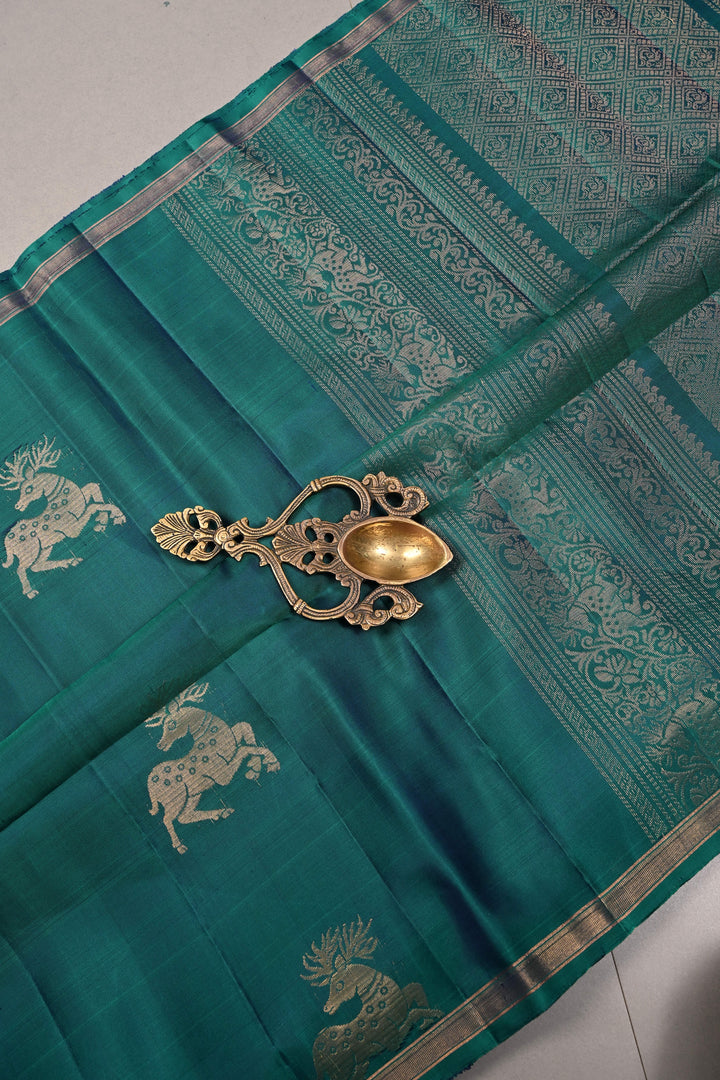 Peacock Green Dual Tone Kanjivaram Soft Silk Saree with Deer Zari Buttas and Minimal Zari Border | SILK MARK CERTIFIED | SHOBITAM