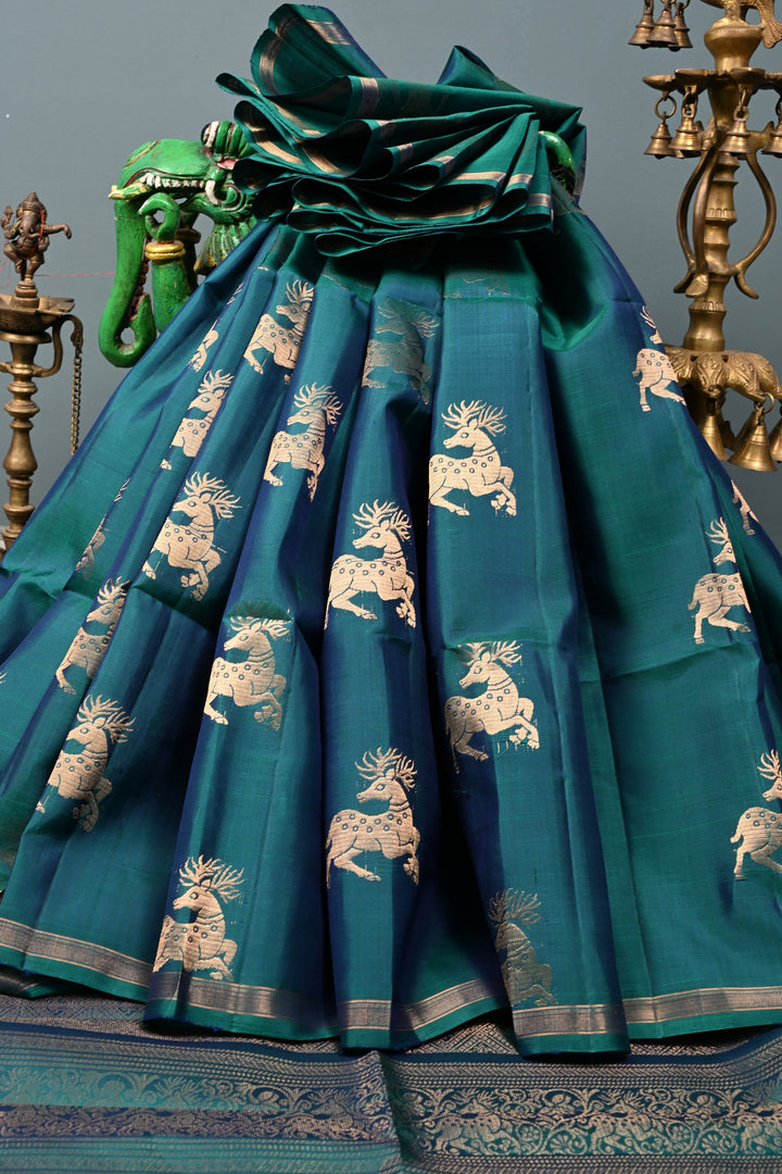 Peacock Green Dual Tone Kanjivaram Soft Silk Saree with Deer Zari Buttas and Minimal Zari Border | SILK MARK CERTIFIED | SHOBITAM