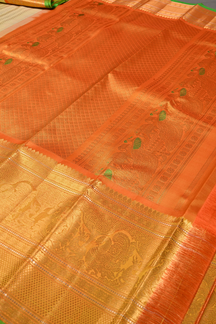 Tea Green Dual Tone Pure Gadwal Silk Saree with Ornate Zari Stripes and Contrast Wide Zari Border | SILK MARK CERTIFIED | SHOBITAM