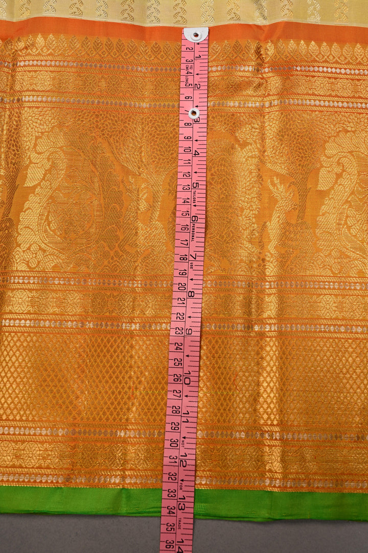 Tea Green Dual Tone Pure Gadwal Silk Saree with Ornate Zari Stripes and Contrast Wide Zari Border | SILK MARK CERTIFIED | SHOBITAM