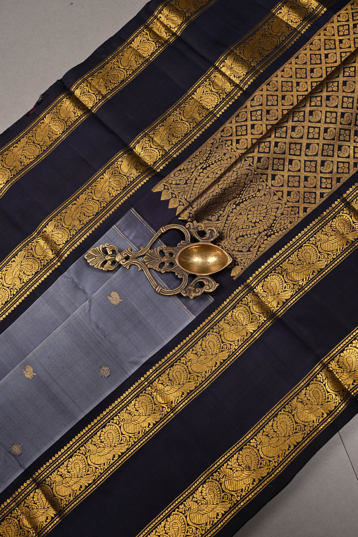 Slate Blue Dual Tone Pure Gadwal Silk Saree with Zari Buttas and Contrast Rettaipet Zari Border | SILK MARK CERTIFIED | SHOBITAM