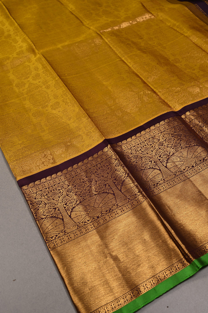 Methi Yellow Gadwal Silk Saree with Peacock-Elephant Brocade and Contrast Wide Zari Border | SILK MARK CERTIFIED | SHOBITAM