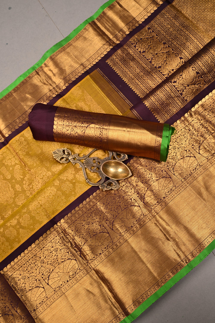 Methi Yellow Gadwal Silk Saree with Peacock-Elephant Brocade and Contrast Wide Zari Border | SILK MARK CERTIFIED | SHOBITAM
