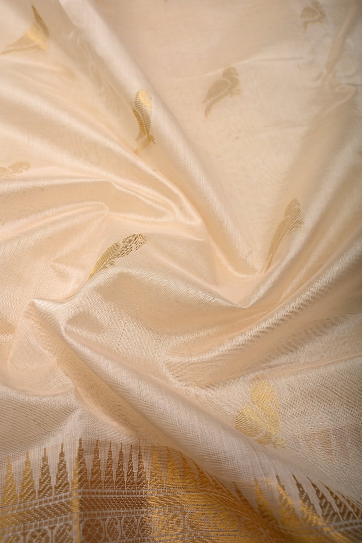Off White Kanchi Silk Cotton 100% Handloom Saree with Birds Zari Buttas and Wide Zari Border | SHOBITAM