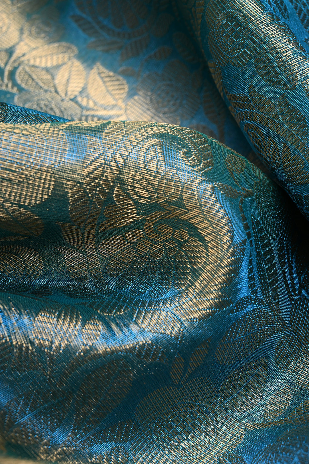 Blue-Green Dual Tone Tissue Kanjivaram Soft Semi Silk Saree with Floral Brocade Jaal and Contrast Wide Zari Border | SHOBITAM