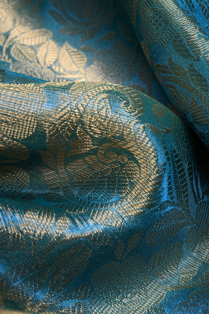 Blue-Green Dual Tone Tissue Kanjivaram Soft Semi Silk Saree with Floral Brocade Jaal and Contrast Wide Zari Border | SHOBITAM