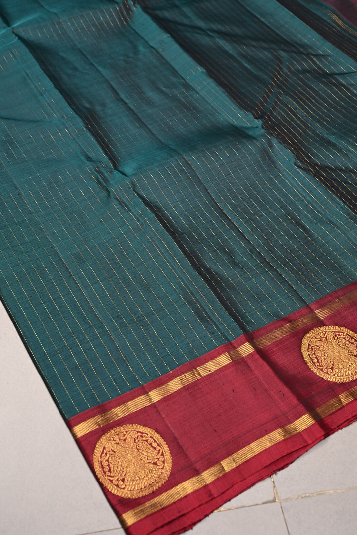 Hunter Green Kanjivaram Pure Silk Saree with Vairaoosi Zari Stripes and Gandaberunda Zari Buttas on Contrast Border | SILK MARK CERTIFIED | SHOBITAM