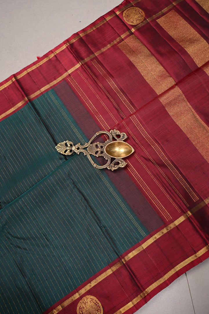 Hunter Green Kanjivaram Pure Silk Saree with Vairaoosi Zari Stripes and Gandaberunda Zari Buttas on Contrast Border | SILK MARK CERTIFIED | SHOBITAM