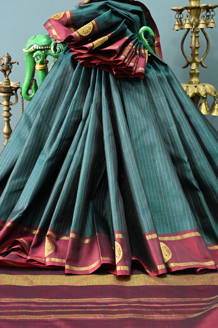 Hunter Green Kanjivaram Pure Silk Saree with Vairaoosi Zari Stripes and Gandaberunda Zari Buttas on Contrast Border | SILK MARK CERTIFIED | SHOBITAM