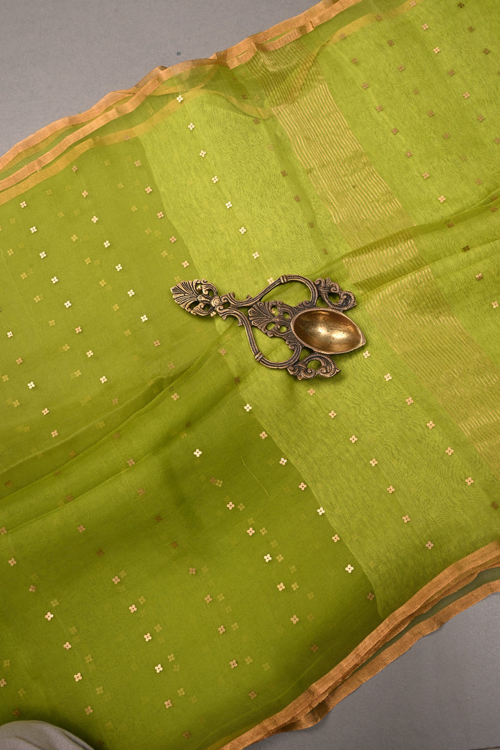 Parrot Green  Matka Muslin Silk Saree with Pocket Sequins and Minimal Zari Border | SILK MARK CERTIFIED | SHOBITAM