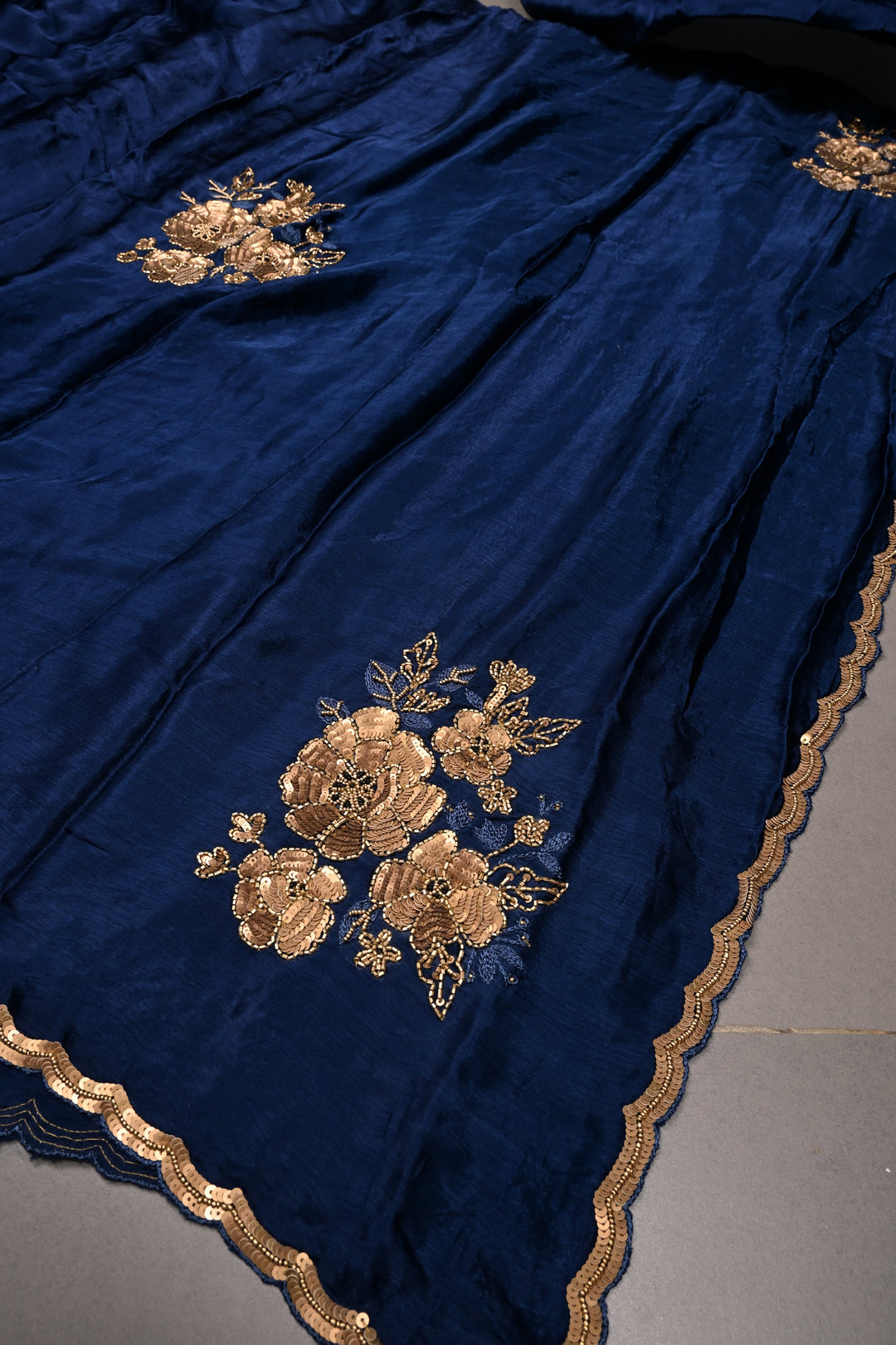 Sapphire Blue Satin Georgette Saree with Antique Matte Finish Cutdana, Sequins and Moti Embellishment and Scallop Border | SHOBITAM