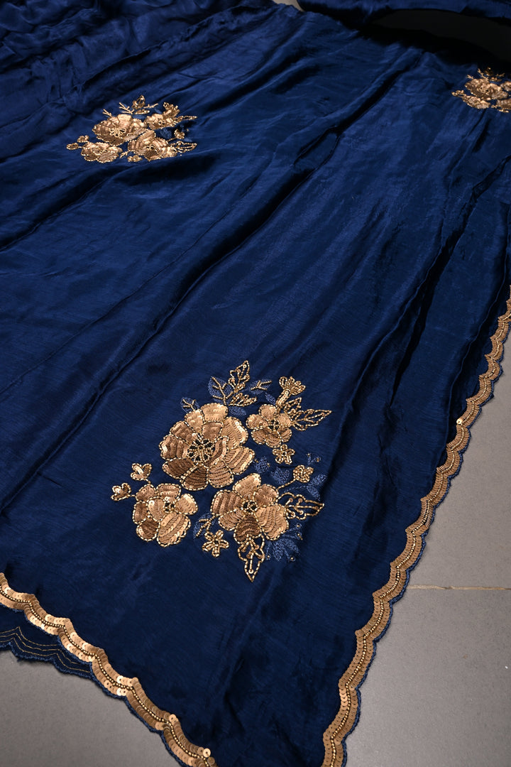 Sapphire Blue Satin Georgette Saree with Antique Matte Finish Cutdana, Sequins and Moti Embellishment and Scallop Border | SHOBITAM