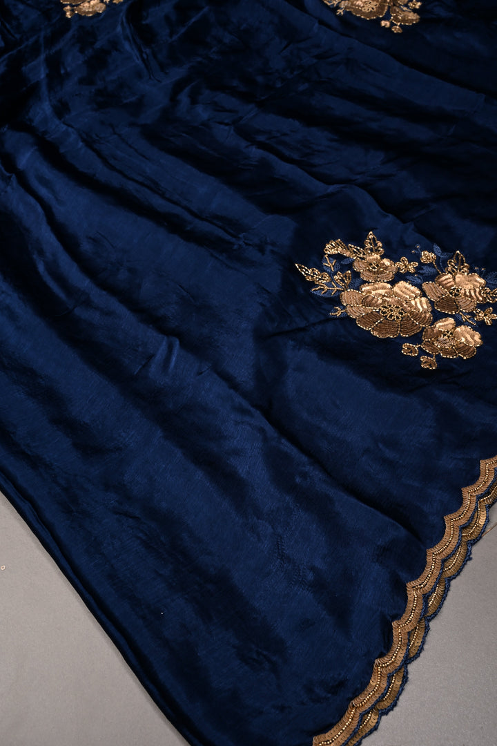Sapphire Blue Satin Georgette Saree with Antique Matte Finish Cutdana, Sequins and Moti Embellishment and Scallop Border | SHOBITAM