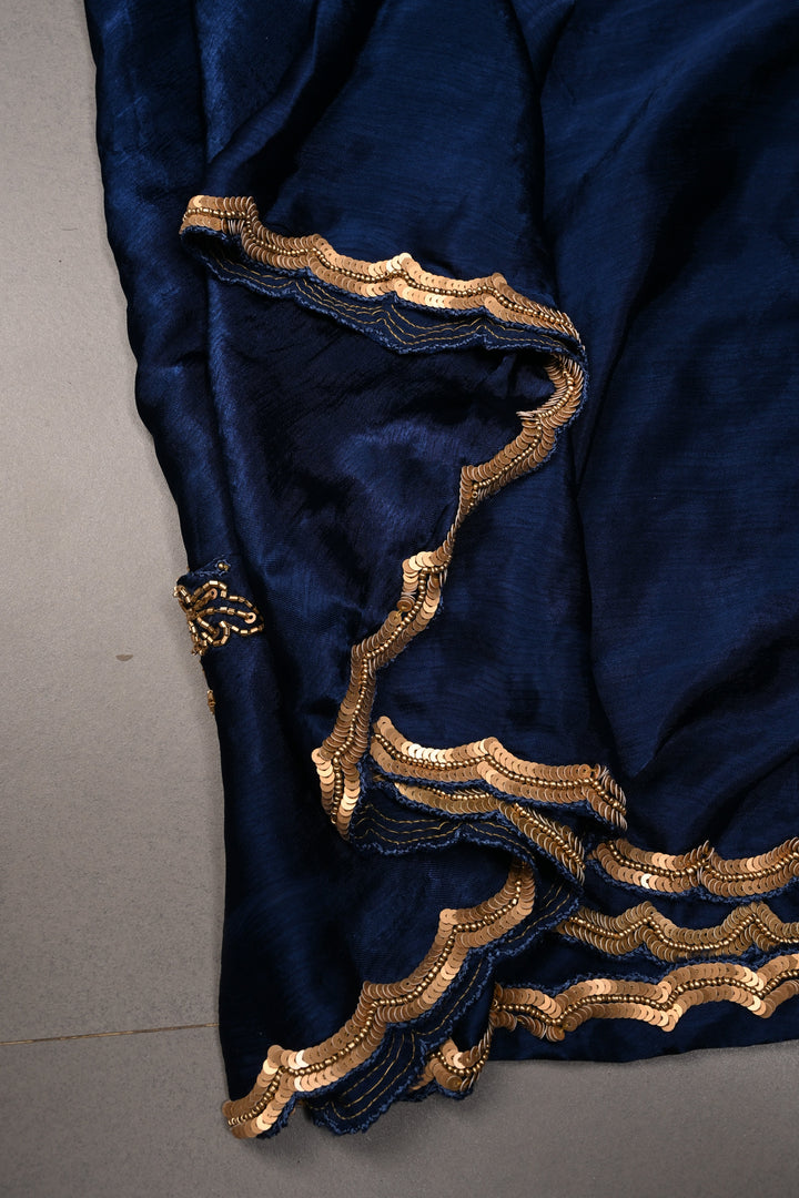 Sapphire Blue Satin Georgette Saree with Antique Matte Finish Cutdana, Sequins and Moti Embellishment and Scallop Border | SHOBITAM