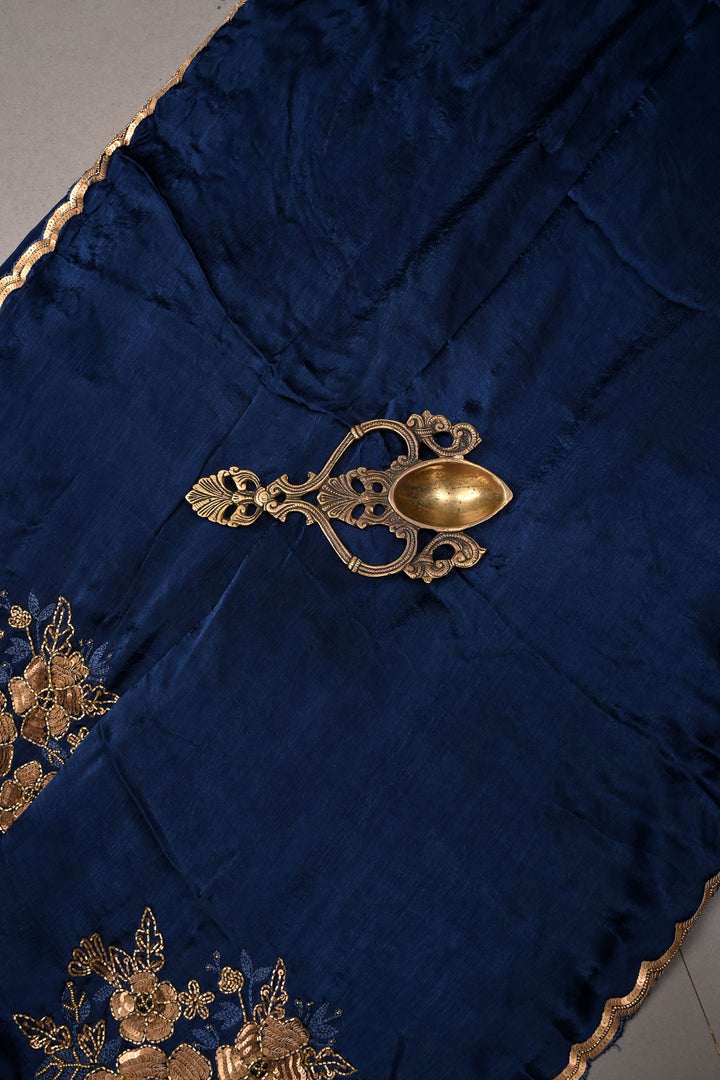 Sapphire Blue Satin Georgette Saree with Antique Matte Finish Cutdana, Sequins and Moti Embellishment and Scallop Border | SHOBITAM