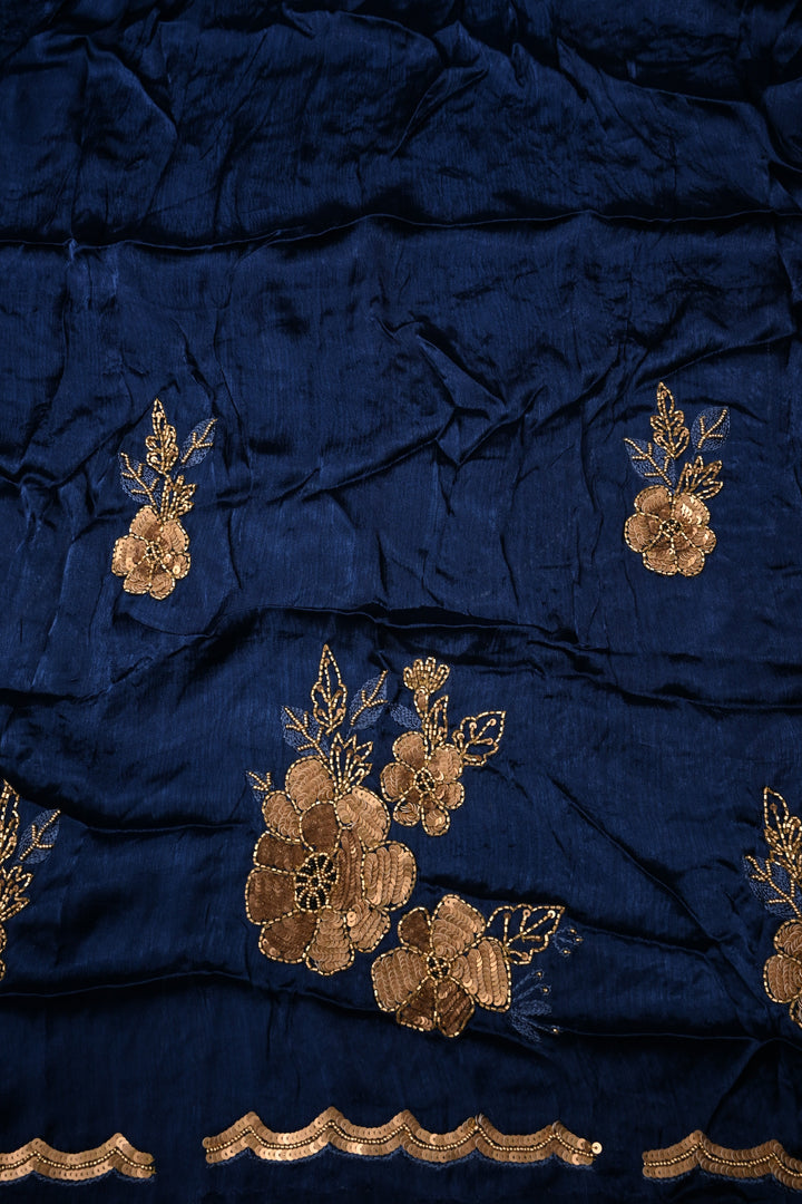 Sapphire Blue Satin Georgette Saree with Antique Matte Finish Cutdana, Sequins and Moti Embellishment and Scallop Border | SHOBITAM