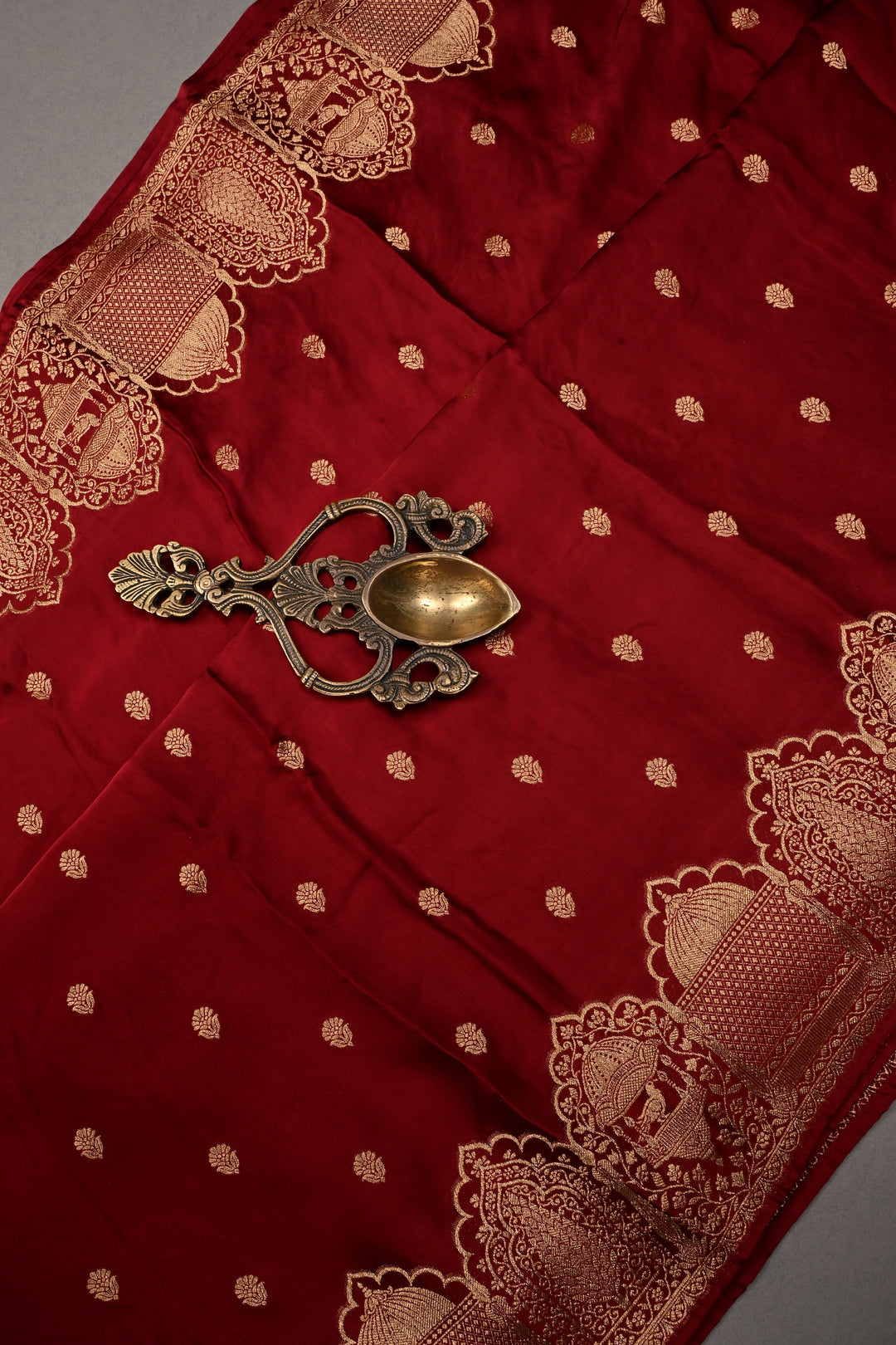 Dark Maroon Vegan Viscose Silk Saree with Floral Zari Buttas and Scallop Zari Border | SHOBITAM