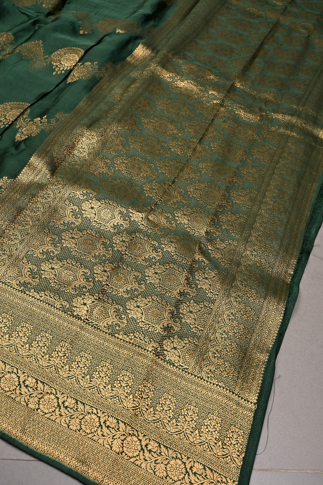 Green Vegan Viscose Silk Saree with ornate scalloped Design and Zari Border | SHOBITAM