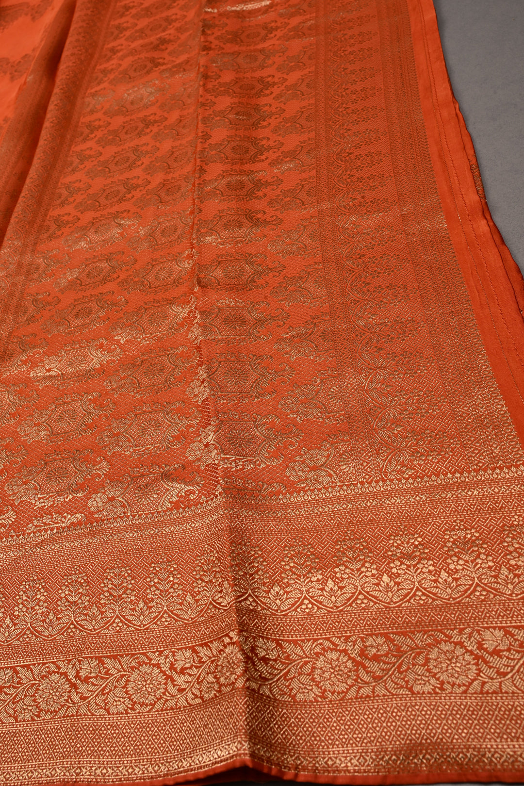 Orange Vegan Viscose Silk Saree with ornate scalloped Design and Zari Border | SHOBITAM