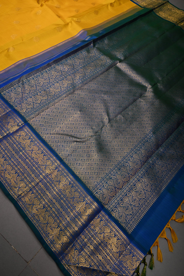 Mango Yellow  Korvai Pure Kanjivaram Silk Saree with Zari Buttas and Contrast Zari Border | SILK MARK CERTIFIED | SHOBITAM
