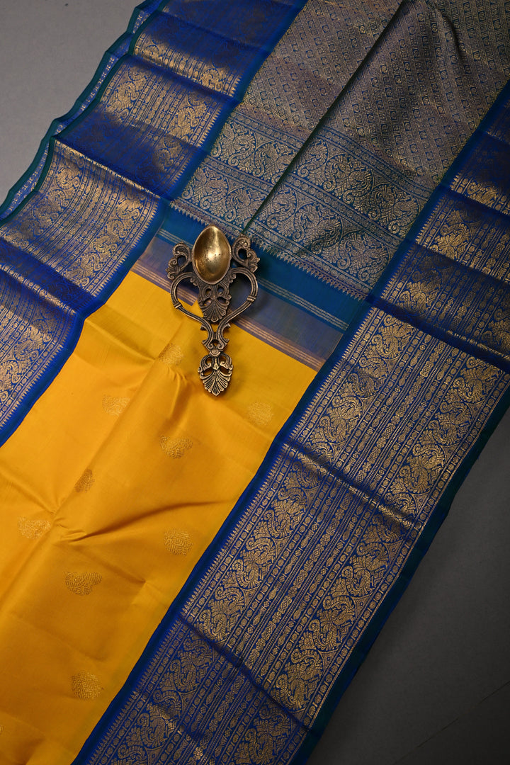 Mango Yellow  Korvai Pure Kanjivaram Silk Saree with Zari Buttas and Contrast Zari Border | SILK MARK CERTIFIED | SHOBITAM