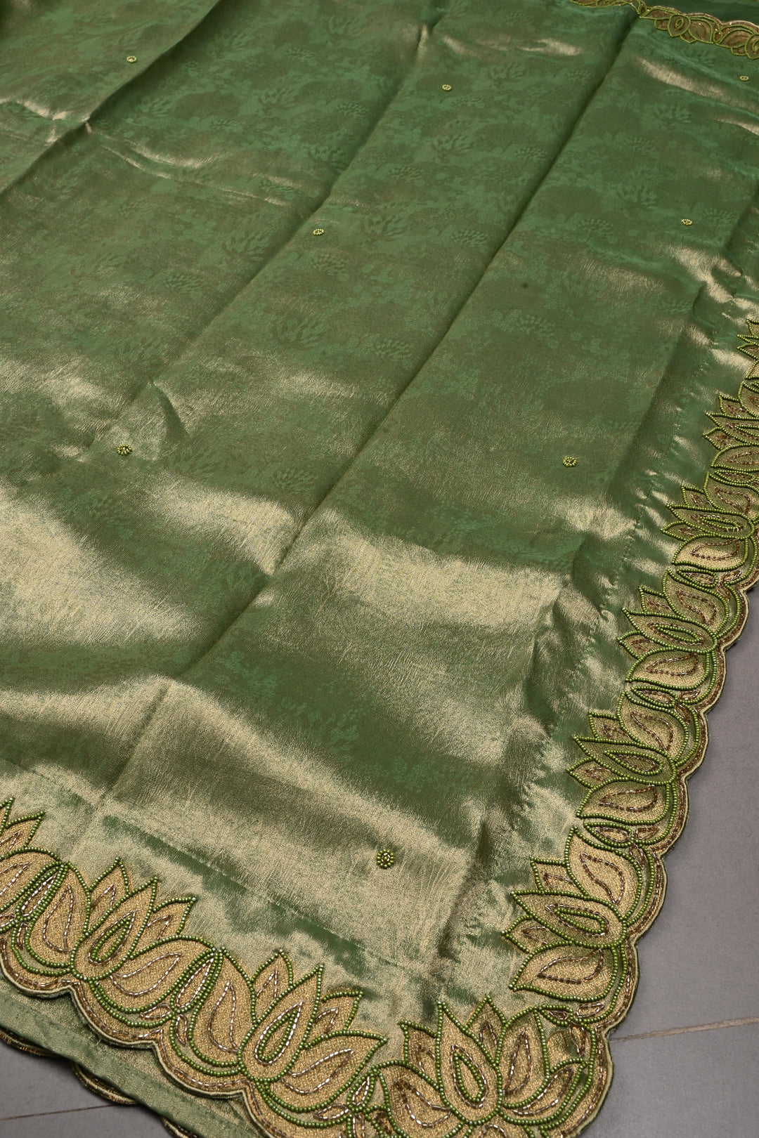 Green Vegan Viscose Tissue Silk Saree with Cutdana and Green Beads Lotus Embroidery Scallop Border | SHOBITAM