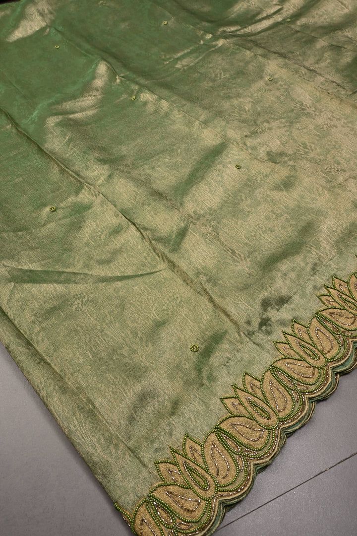 Green Vegan Viscose Tissue Silk Saree with Cutdana and Green Beads Lotus Embroidery Scallop Border | SHOBITAM