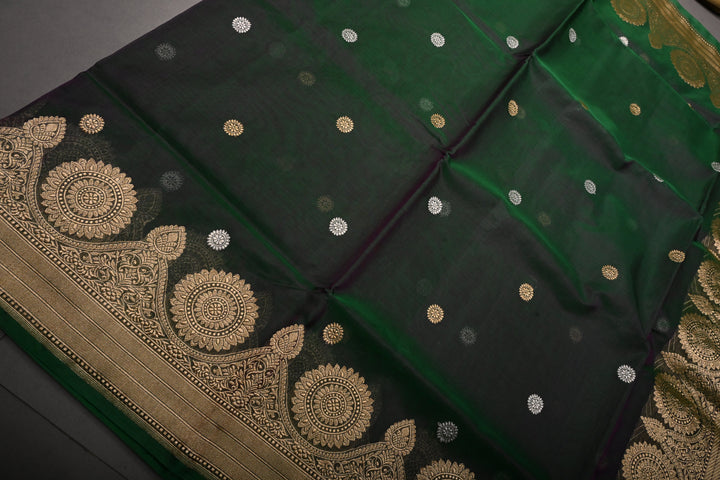 Green Dual tone Pure Banarasi Kora Silk Saree with Sona Rupa Chakram Buttas and Scallop Zari Border | SILK MARK CERTIFIED | SHOBITAM