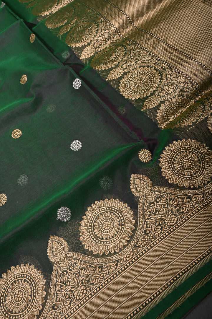 Green Dual tone Pure Banarasi Kora Silk Saree with Sona Rupa Chakram Buttas and Scallop Zari Border | SILK MARK CERTIFIED | SHOBITAM
