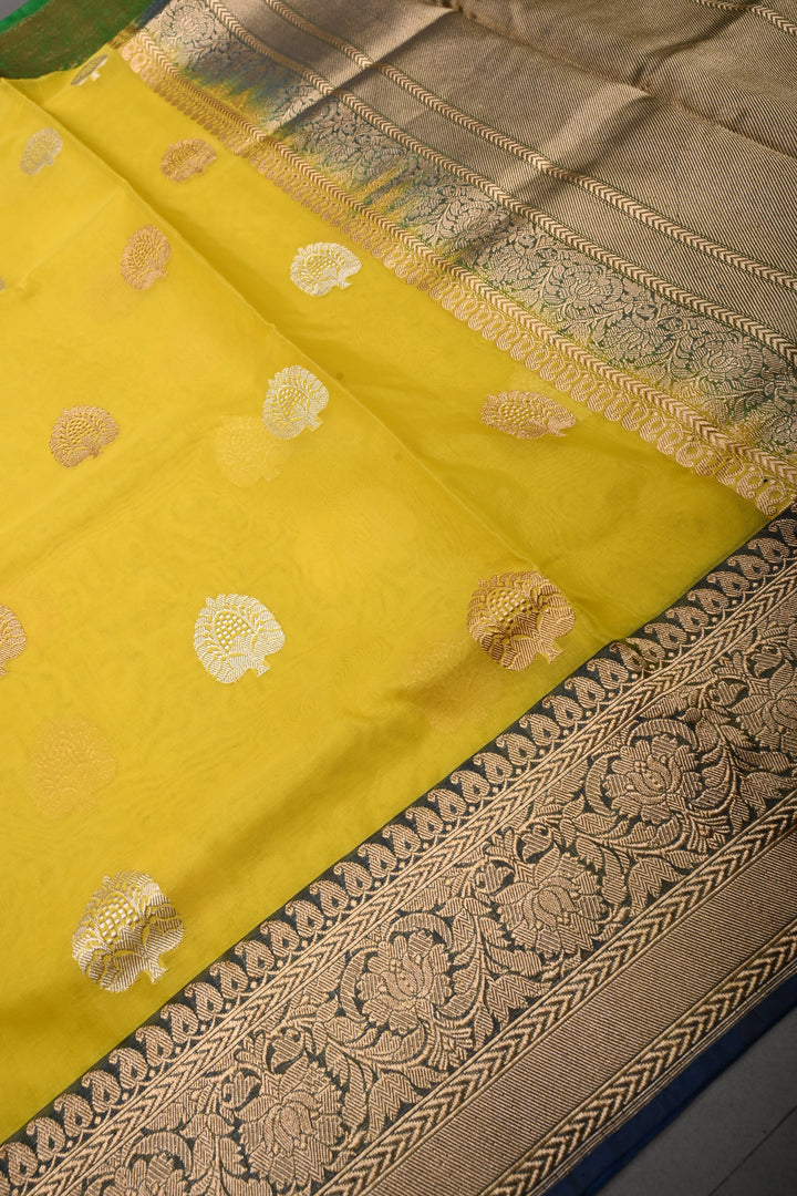 Exquisite Yellow Kora Banarasi Silk Saree with Ganga Jamuna Border and Grand Pallu with Zari | Silk Mark Certified | Shobitam Saree