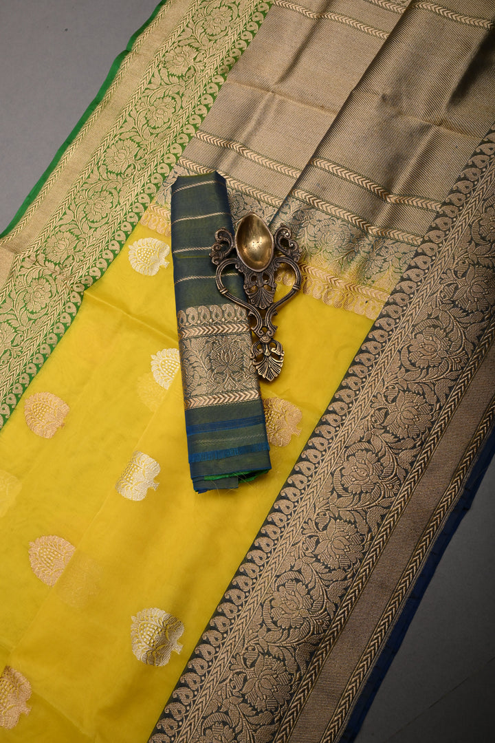 Exquisite Yellow Kora Banarasi Silk Saree with Ganga Jamuna Border and Grand Pallu with Zari | Silk Mark Certified | Shobitam Saree