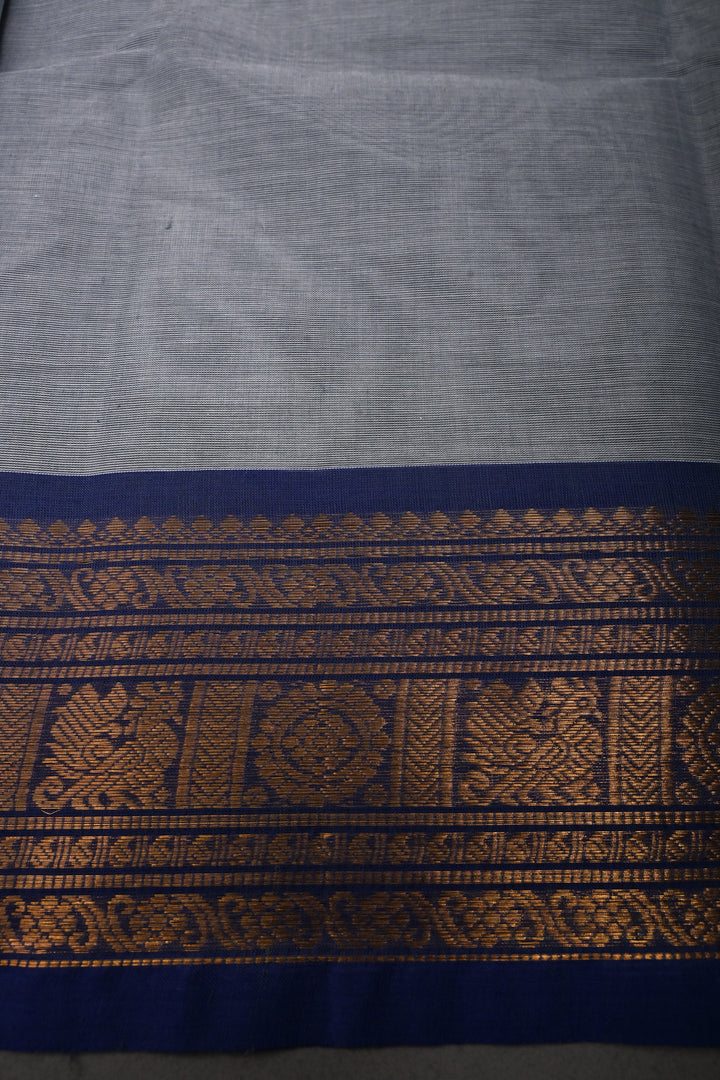 Cement Gray Kanchi Cotton Saree with Meenakari Thread Buttas and Ganga Jamuna Contrast Zari Borders | SHOBITAM