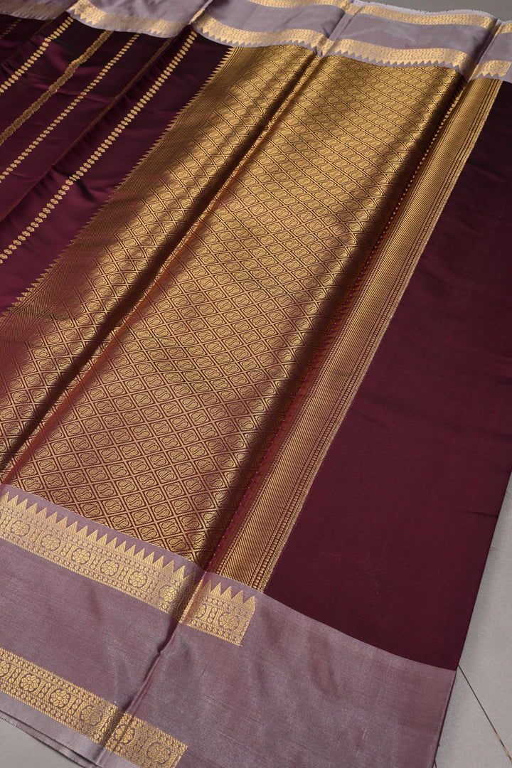 Plum Kanjivaram Soft Semi Silk Saree with Ornate Zari Stripes and Rettaipet Zari Border | SHOBITAM