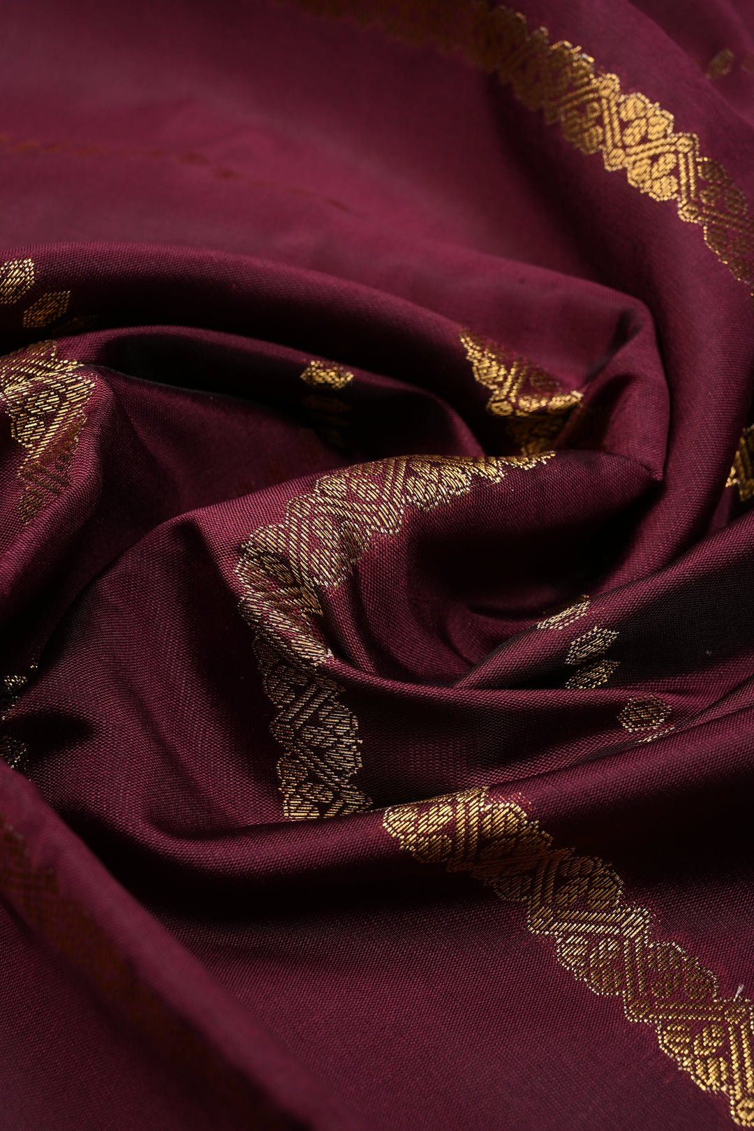 Plum Kanjivaram Soft Semi Silk Saree with Ornate Zari Stripes and Rettaipet Zari Border | SHOBITAM