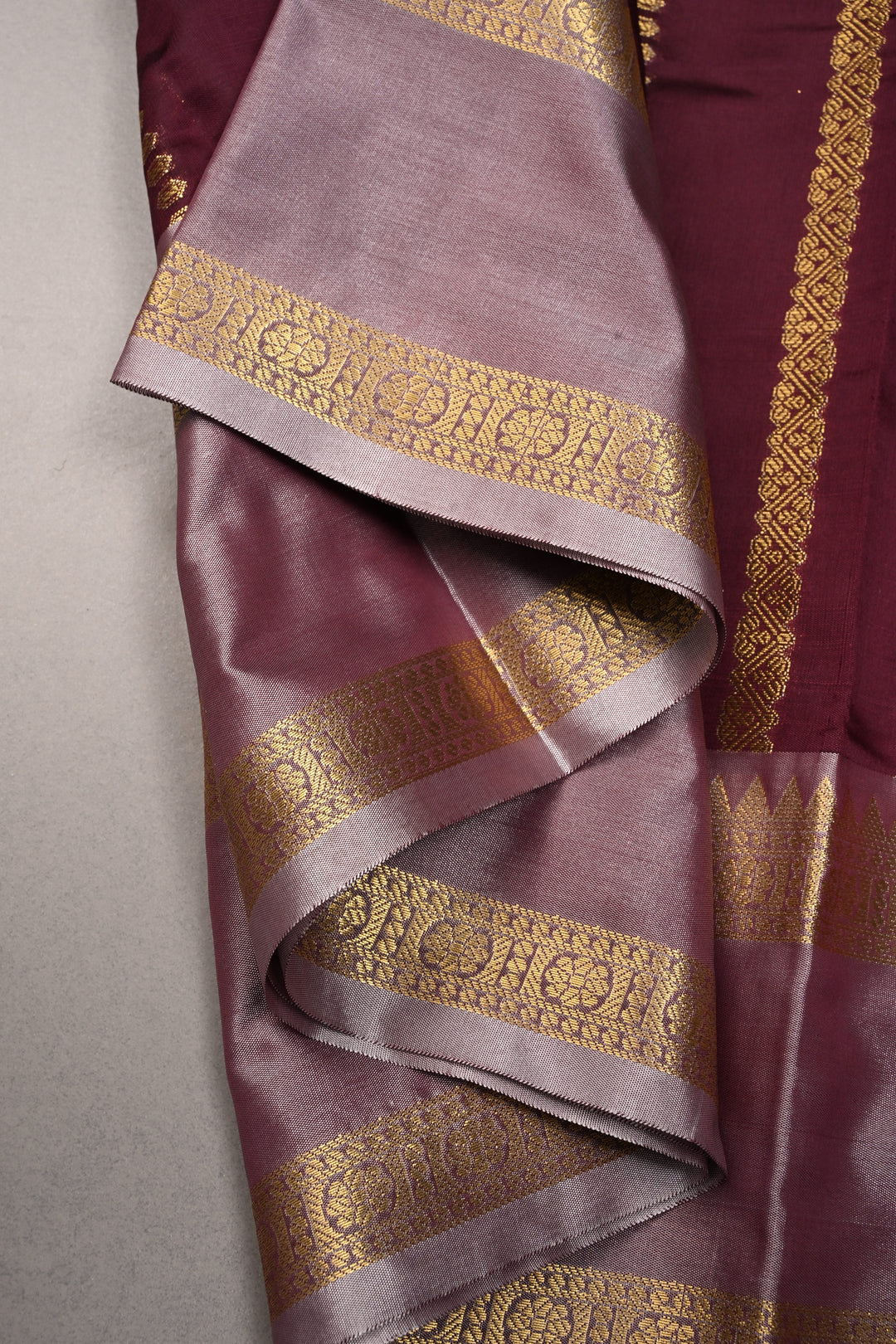 Plum Kanjivaram Soft Semi Silk Saree with Ornate Zari Stripes and Rettaipet Zari Border | SHOBITAM
