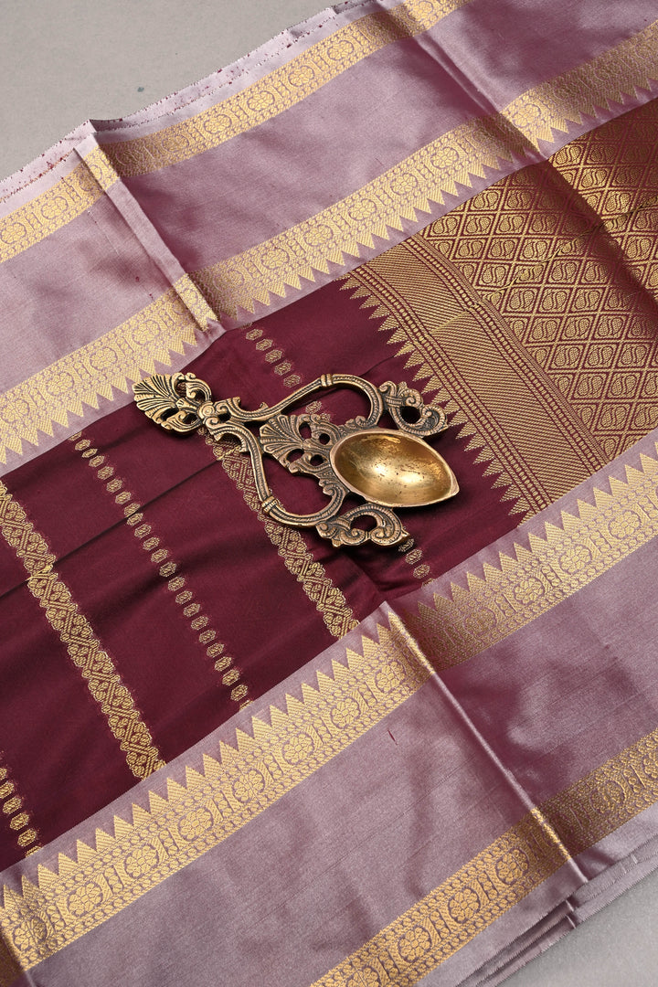 Plum Kanjivaram Soft Semi Silk Saree with Ornate Zari Stripes and Rettaipet Zari Border | SHOBITAM