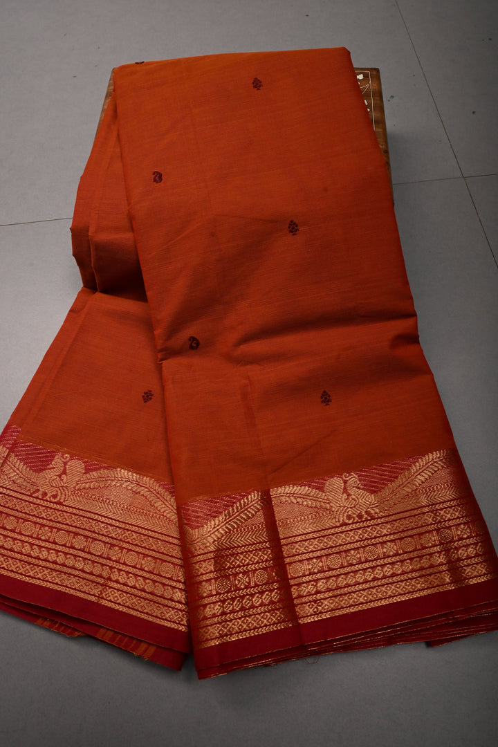 Rust Orange Kanchi Cotton Saree with Thread Buttas and Contrast Zari Borders | SHOBITAM
