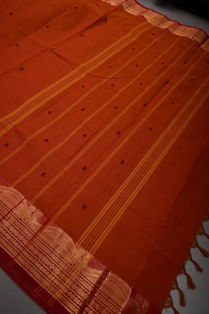 Rust Orange Kanchi Cotton Saree with Thread Buttas and Contrast Zari Borders | SHOBITAM