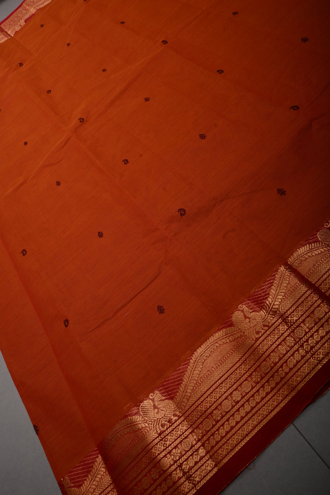 Rust Orange Kanchi Cotton Saree with Thread Buttas and Contrast Zari Borders | SHOBITAM